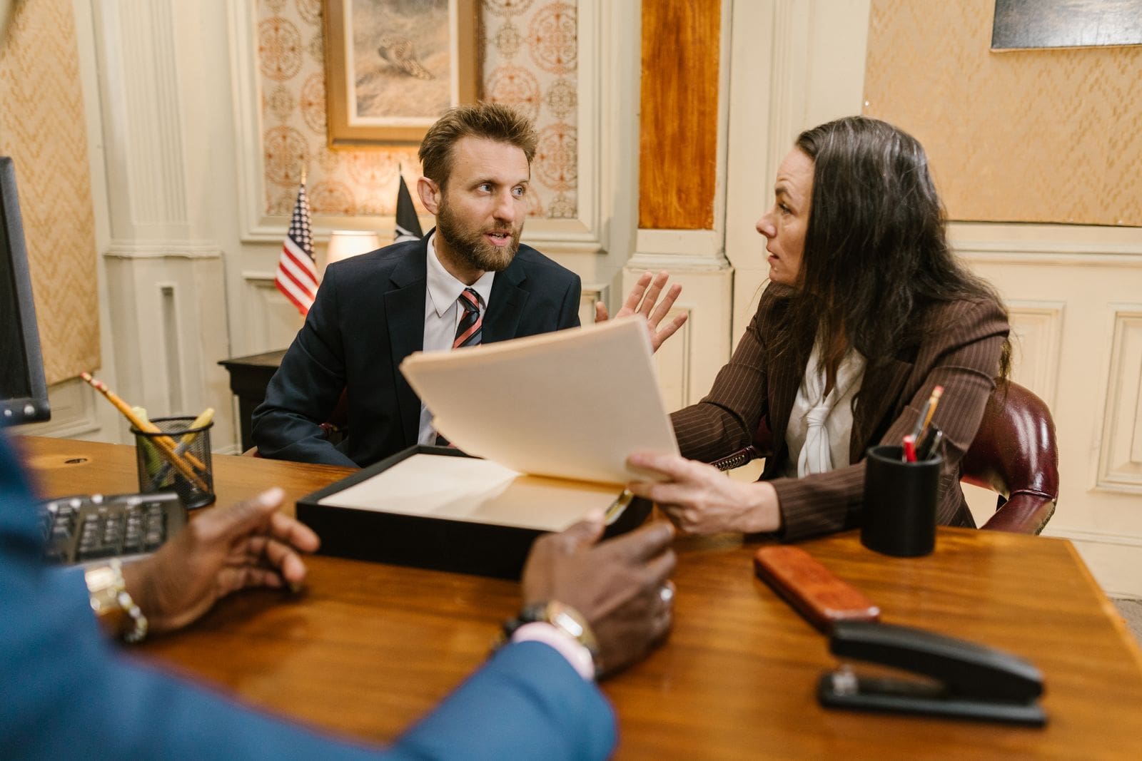 A personal injury attorney meets with a client to discuss their case in Burrillville, Rhode Island