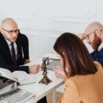A criminal defense attorney meets with a client to discuss their case in Reno, Nevada