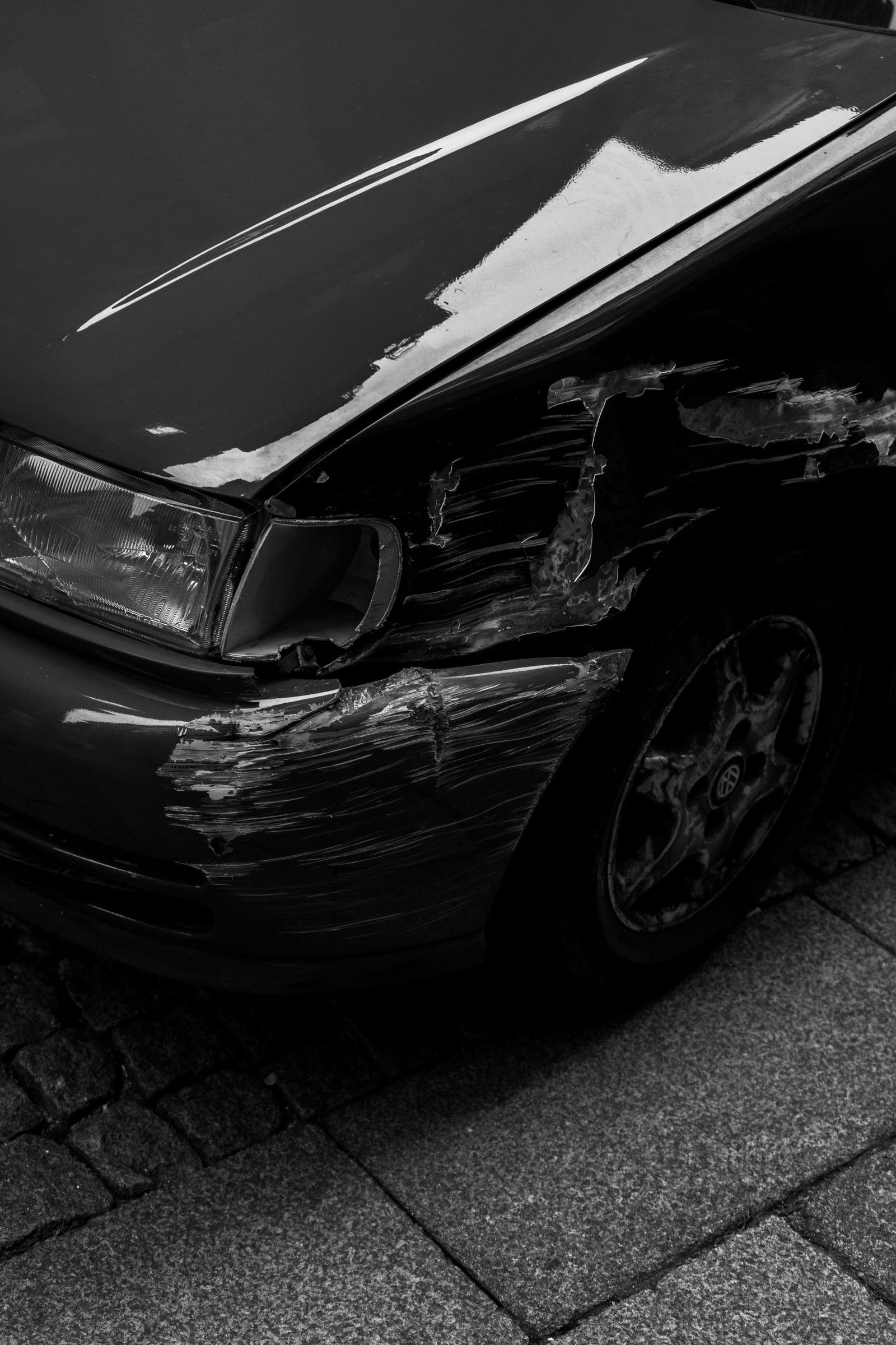 Damage to the front of a car, the kind of crash a personal injury attorney handles in West Valley City, Utah