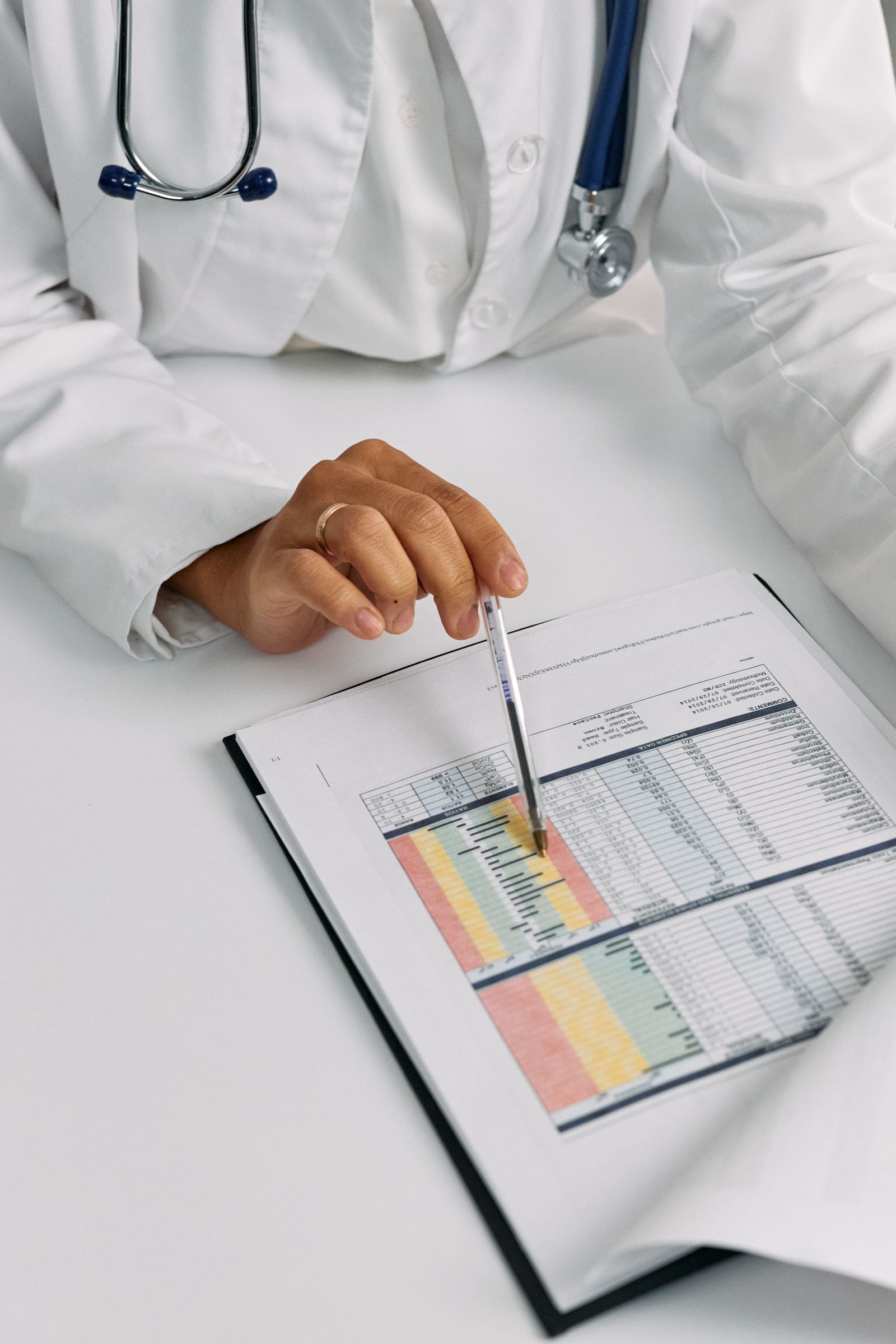 A doctor reviews a patient's test results, the kind of records examined in a medical malpractice claim in Salt Lake City, Utah
