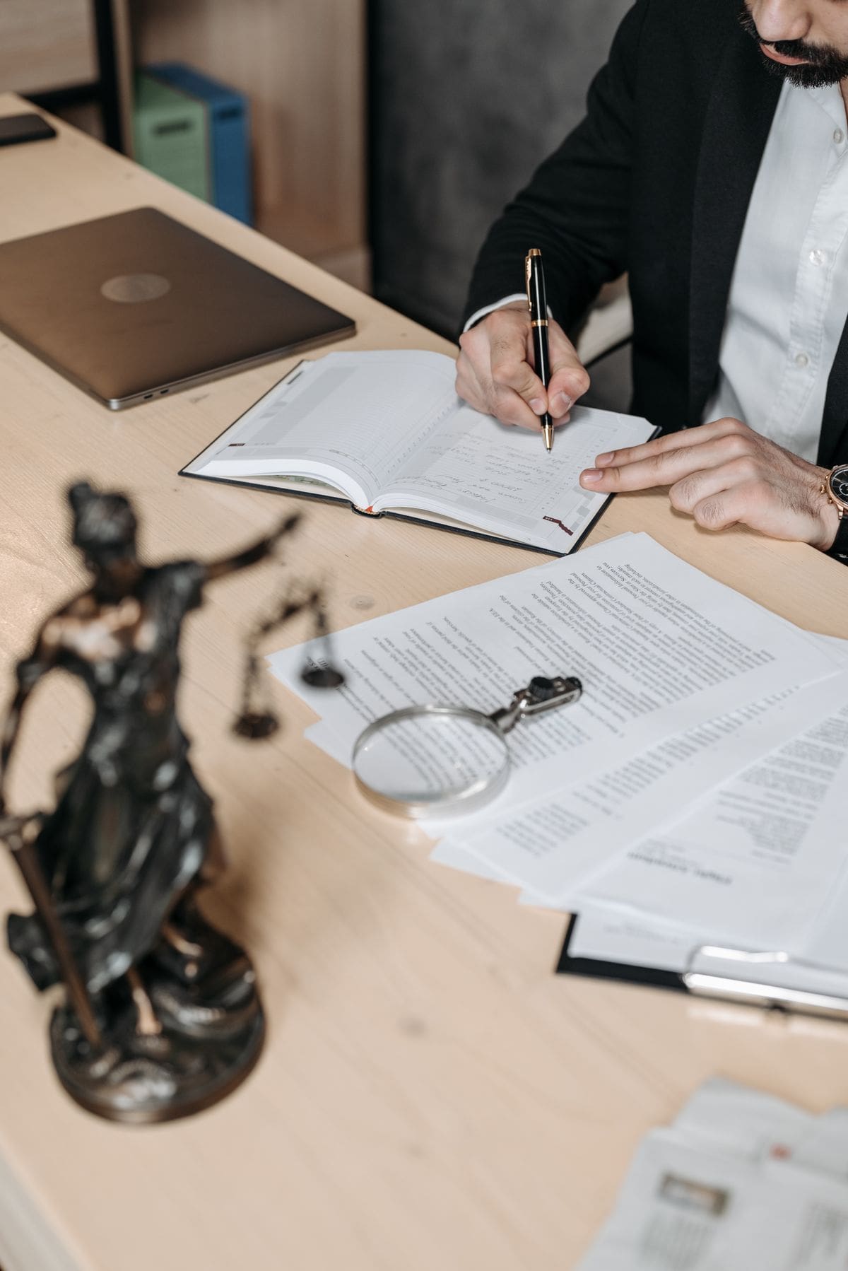 An attorney reviews paperwork for a personal injury case in Lewistown, Montana